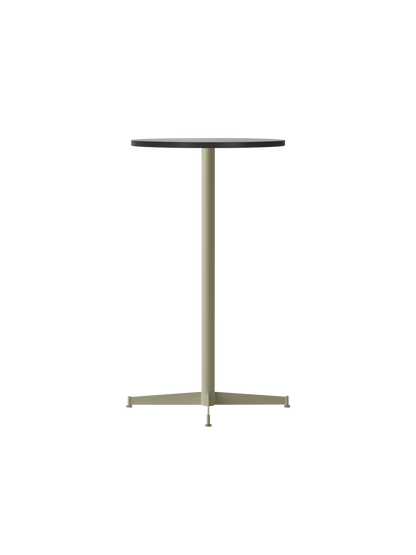 Angled view of the Nook Bar Table with a round black oak top on an olive green powder-coated steel column and cross base.