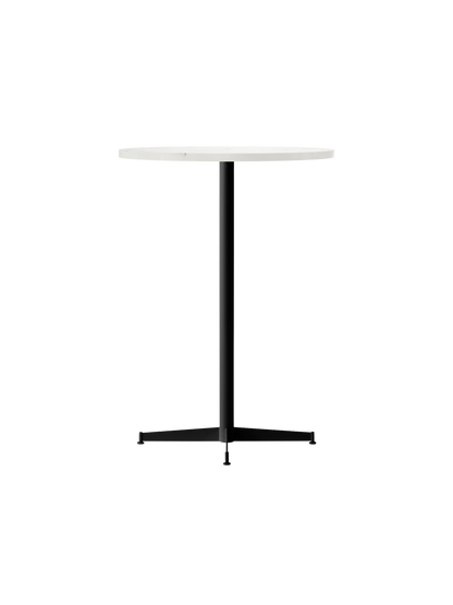 An angled, studio shot of the Nook Bar Table, featuring a round, light-coloured top and a slender black base with four feet.