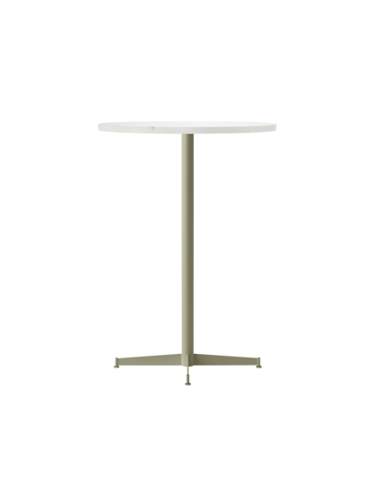 The Nook Bar Table shown from an angle, featuring a round white tabletop and a slim, ivory powder-coated steel pedestal base.