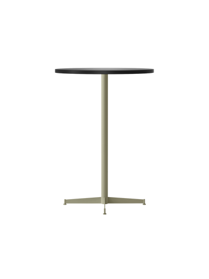 An angle view of the Nook Bar Table, featuring a dark circular tabletop on a tall, slender olive powder-coated steel base.