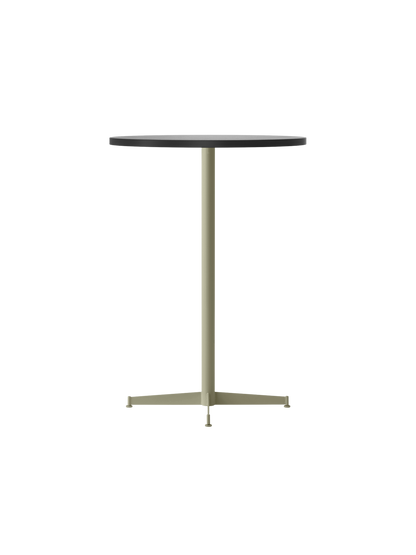 An angled view of the Nook Bar Table, featuring a round, dark grey tabletop and a slender, ivory-coloured pedestal base.