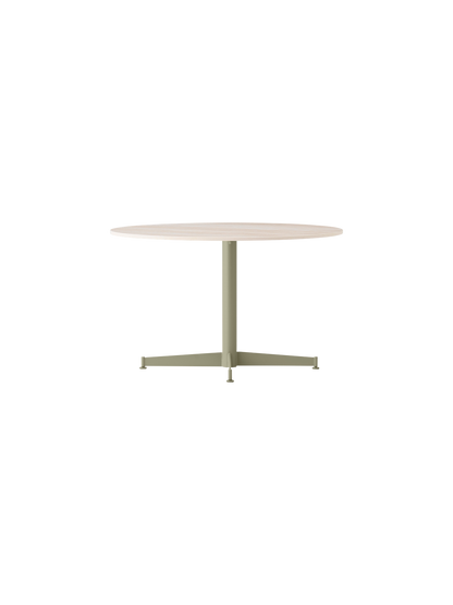 An angled view of the Nook Lounge Table, featuring a light-coloured stone top and an olive green four-star pedestal base.