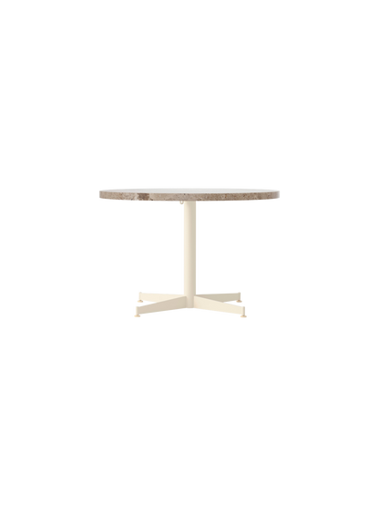 Front view of the Nook Lounge Table, featuring a round Kunis Breccia stone top and an ivory four-star pedestal base.
