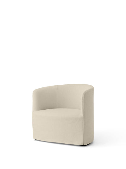Angled view of the Tearoom Lounge Chair upholstered in textured, light beige Logan Jasmin fabric against a white background.
