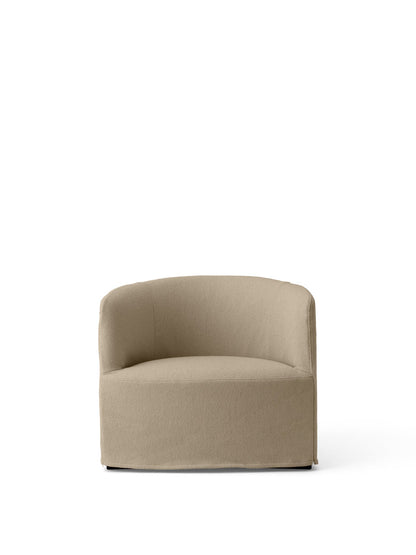 A front-facing Tearoom Lounge Chair with a curved backrest, fully upholstered in a textured, sand-coloured Logan fabric.