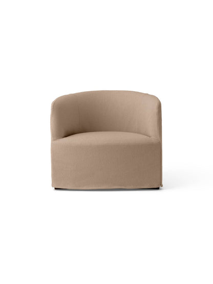 A front view of the Tearoom Lounge Chair with a Loose Cover in the textured, beige Logan Flint fabric.