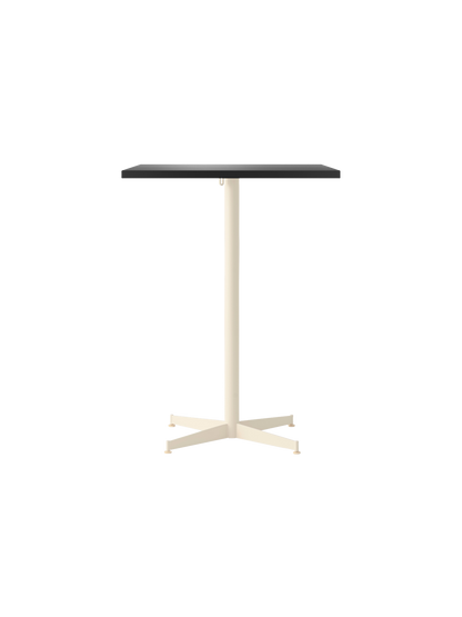 Front view of the Nook Counter Table with a rectangular dark grey top and a slender ivory pedestal on a black background.