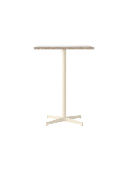 Front view of the Nook Counter Table with a square Kunis Breccia stone tabletop and an ivory-coloured metal pedestal base.