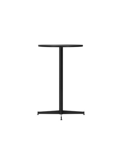 An angled view of the Nook Counter Table, featuring a round charcoal linoleum top and a slender black steel pedestal base.