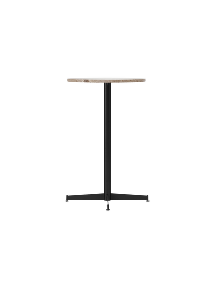 Nook Counter Table shown from an angle, with a circular Kunis Breccia stone top and a slim, black powder-coated steel base.