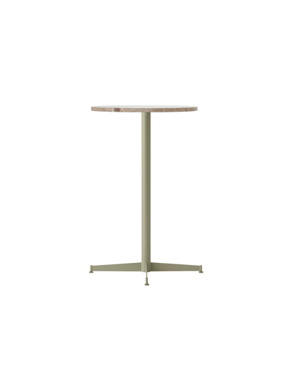 Angled view of the Nook Counter Table with a round Kunis Breccia stone top and an olive powder-coated steel base.