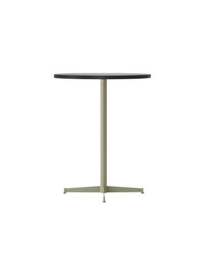 Angled view of the Nook Counter Table, featuring a round Kunis Breccia stone top and a four-pronged olive metal base.