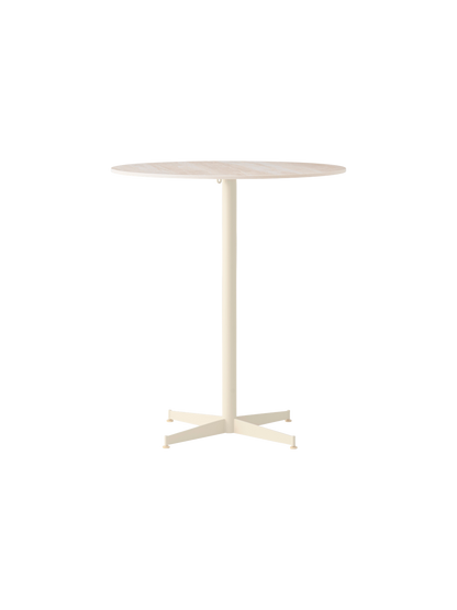 Front view of the Nook Counter Table, with a round, light-coloured marble top on a slim, ivory pedestal base with four feet.