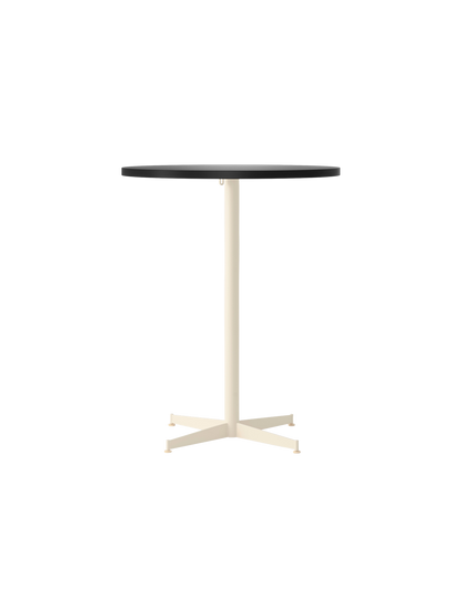 Front view of the Nook Counter Table, showing its round, dark charcoal tabletop and slim, ivory pedestal base with four feet.