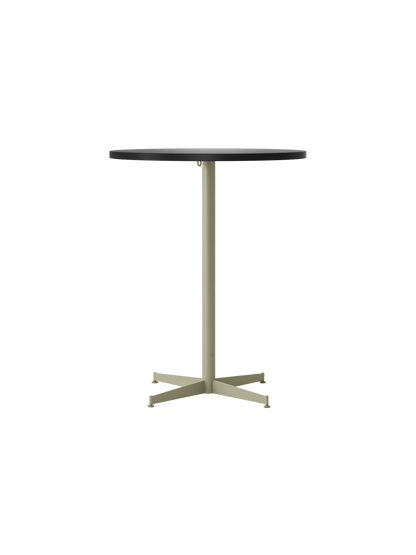 Front-on photograph of the Nook Counter Table, showing its round, charcoal linoleum top and slim, olive-coloured metal base.