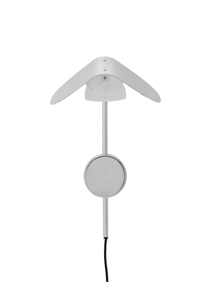 The Wing Wall Lamp in polished aluminium, shown from above, switched off, with a wing-shaped shade and round mount.