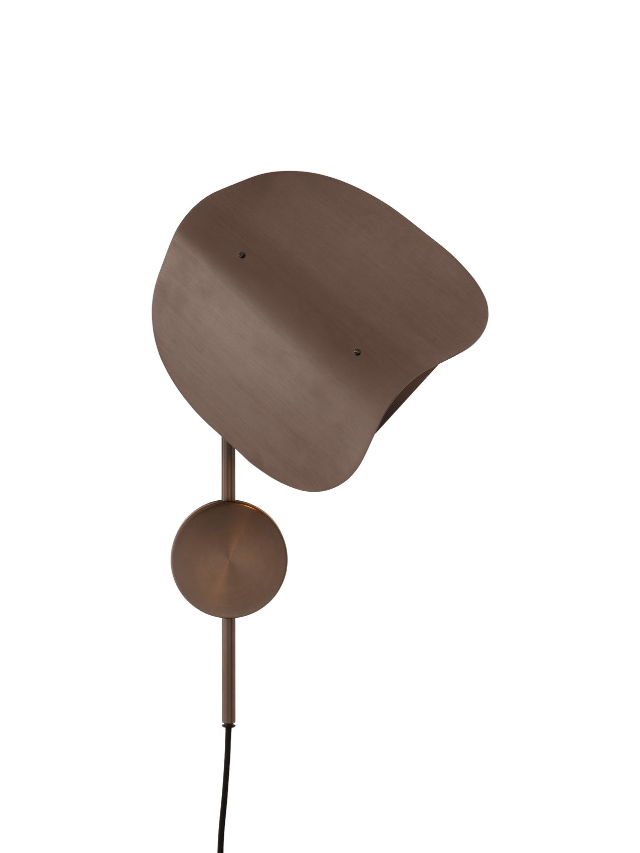 A close-up of the Wing Wall Lamp in bronzed aluminium, lit against a black background to show its sculptural, folded shade.