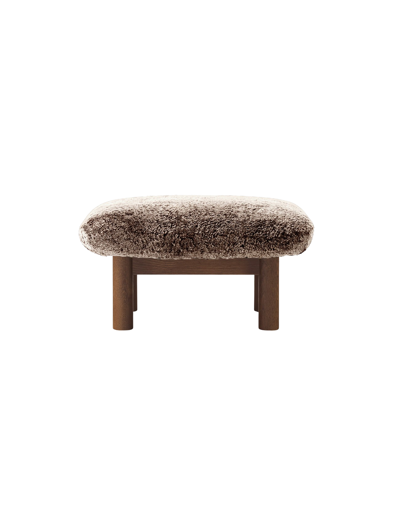 Front view of the Brasilia Ottoman with a dark stained oak frame, cylindrical legs and a fluffy Root sheepskin cushion.