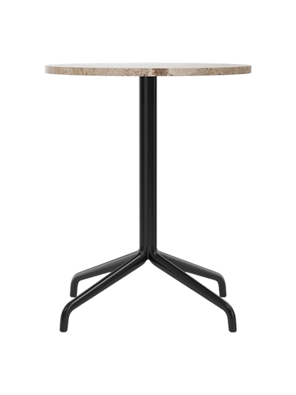 A front view of the Harbour Column Dining Table, featuring a round Kunis Breccia stone top and a black four-legged star base.