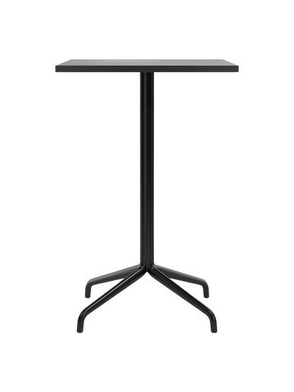 Front view of the Harbour Column Counter Table with a rectangular black oak top and a black star base on a black background.