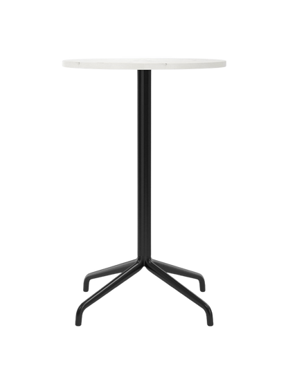 Front view of the Harbour Column Counter Table, featuring a round, white Estremoz marble top and a slim black star base.