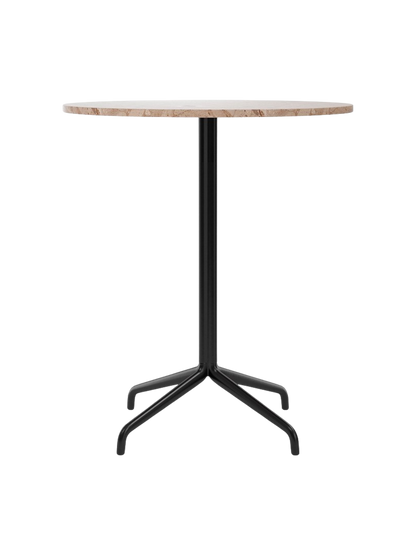 A front view of the Harbour Column Counter Table, featuring a round Kunis Breccia stone top and a black metal star base.
