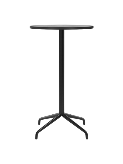 Front view of the Harbour Column Bar Table with a round black oak top, slender black central column, and a star-shaped base.
