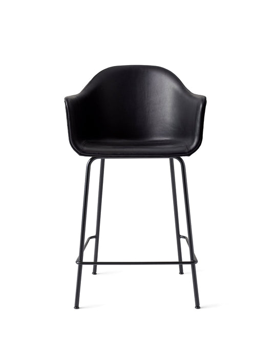 Front view of the black upholstered Harbour Counter Chair, featuring a curved seat and armrests on a black steel frame.