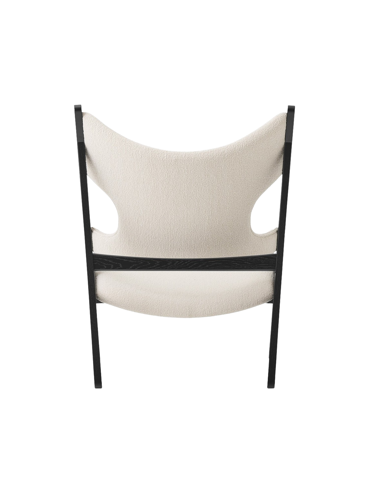 Rear view of the Knitting Lounge Chair in black oak with ivory bouclé upholstery, showing the distinctive cutouts.