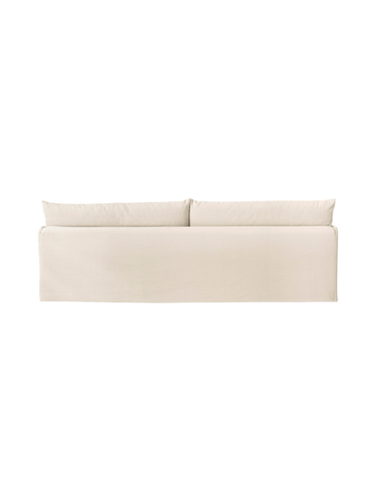 A rear view of the Offset Sofa with Loose Cover, a 3-seater model in a textured, off-white Logan Jasmine fabric.