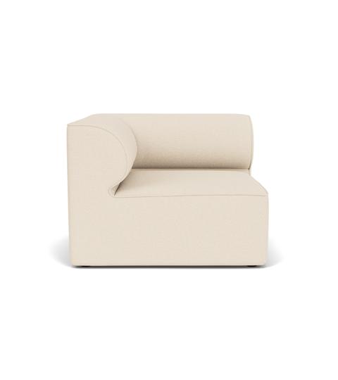Front view of the Eave Modular Sofa, 96, Corner, upholstered in a light cream fabric with a distinctive curved backrest.