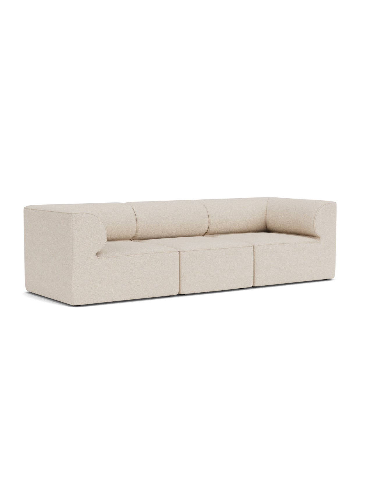 Eave Modular Sofa, 96, 3-Seater, Configuration 2 in light upholstery. Angled view showing low profile and curved armrests.