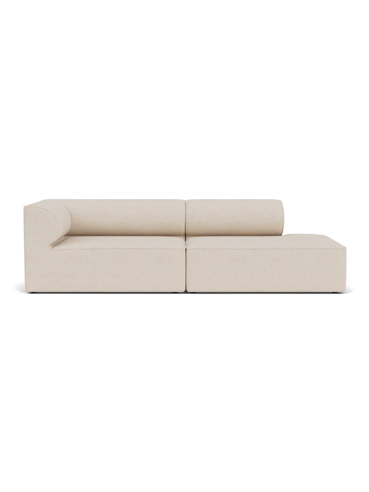 A front-on view of the light-coloured Eave Modular Sofa, a 2.5-seater configuration with a curved armrest and an open end.
