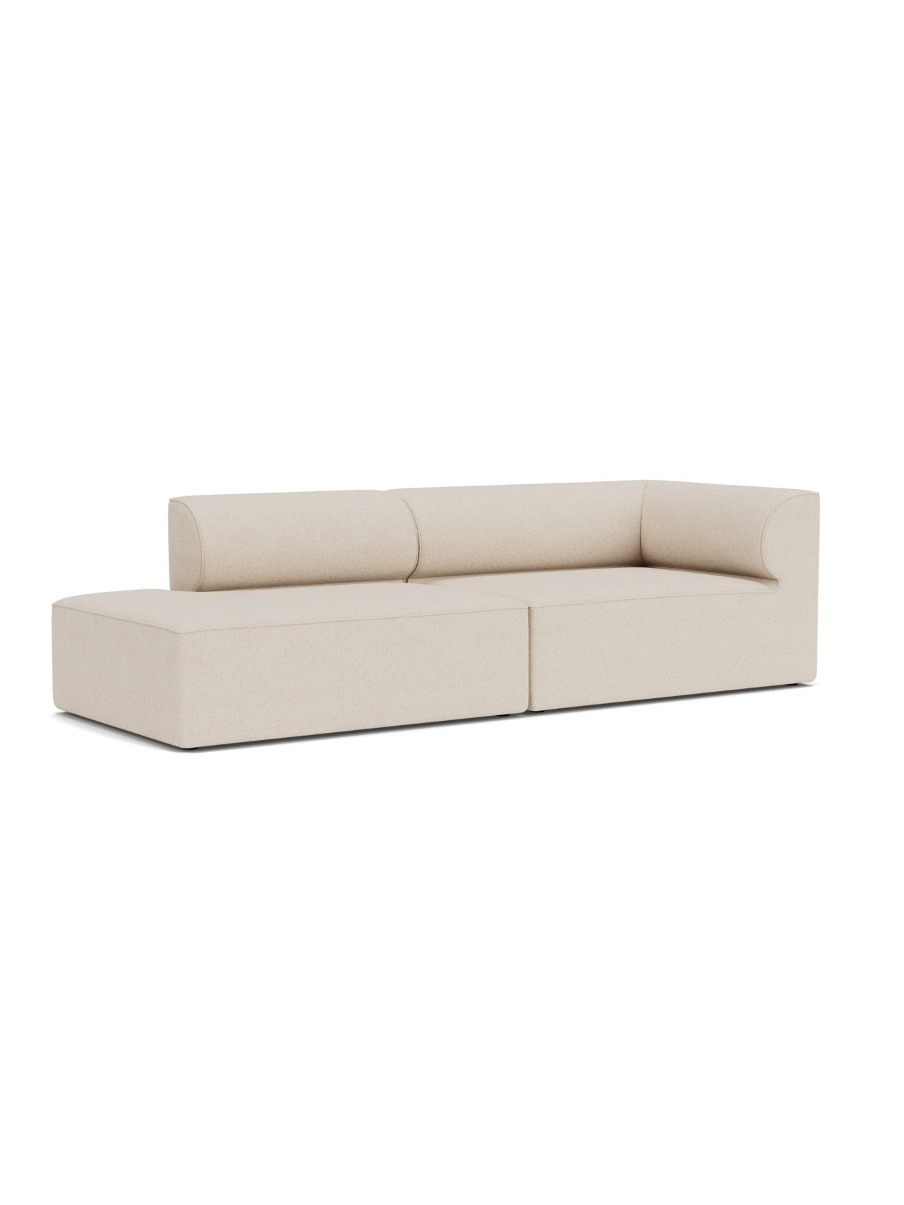 An angle view of the light beige Eave Modular Sofa, 96, Configuration 4. The sofa features a chaise lounge on the left.