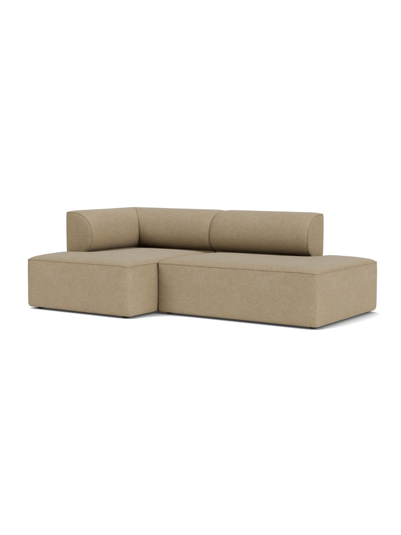 The Eave Modular Sofa, Configuration 7, a 2.5-seater with chaise longue in light brown bouclé fabric, shown from an angle.