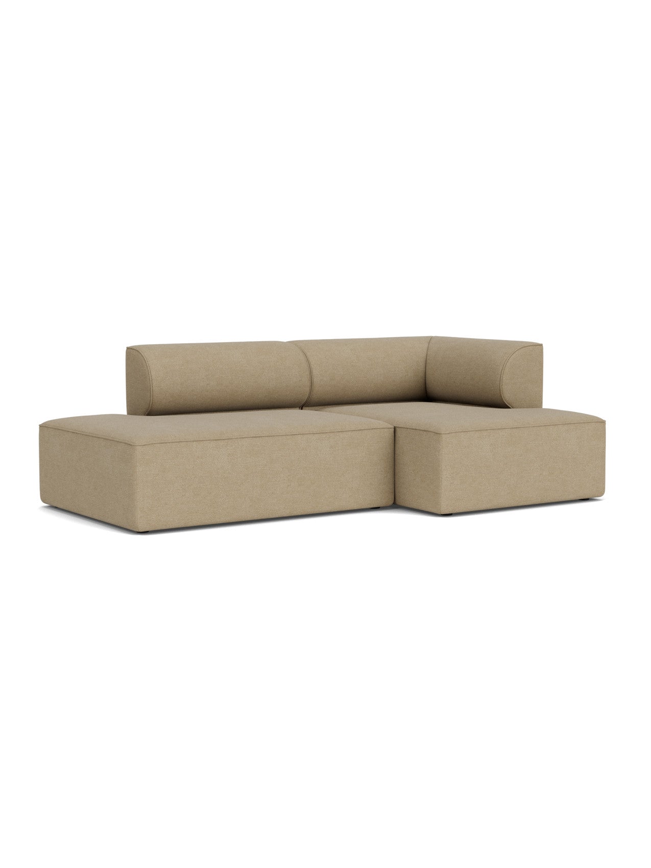 An angled view of the Eave Modular Sofa, 96, Configuration 8, a right-corner sofa with a chaise longue in beige bouclé.