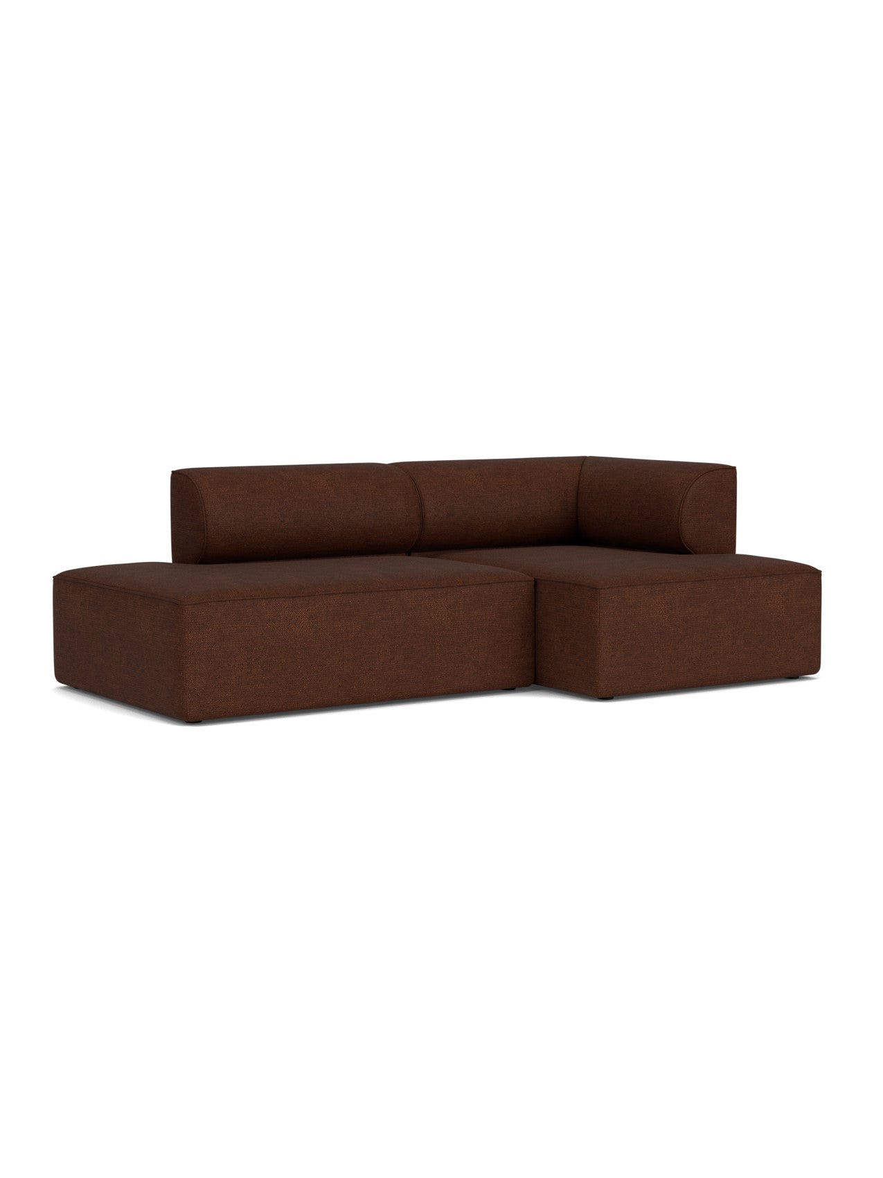 A low-profile Eave Modular Sofa, Configuration 8, with a right corner chaise, upholstered in textured brown Bouclé 08 fabric.
