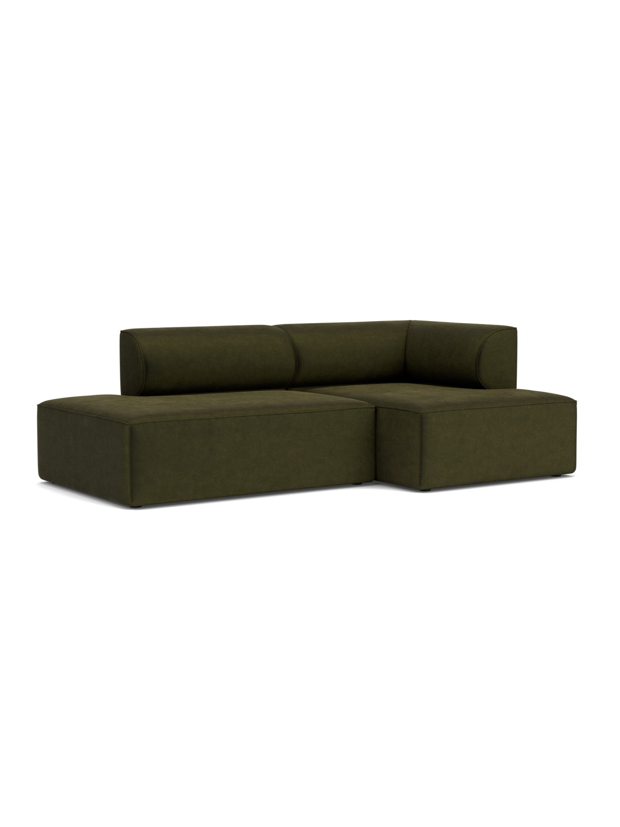 An angle view of the Eave Modular Sofa, 2.5-seater, Configuration 8, upholstered in a dark green Champion 035 fabric.