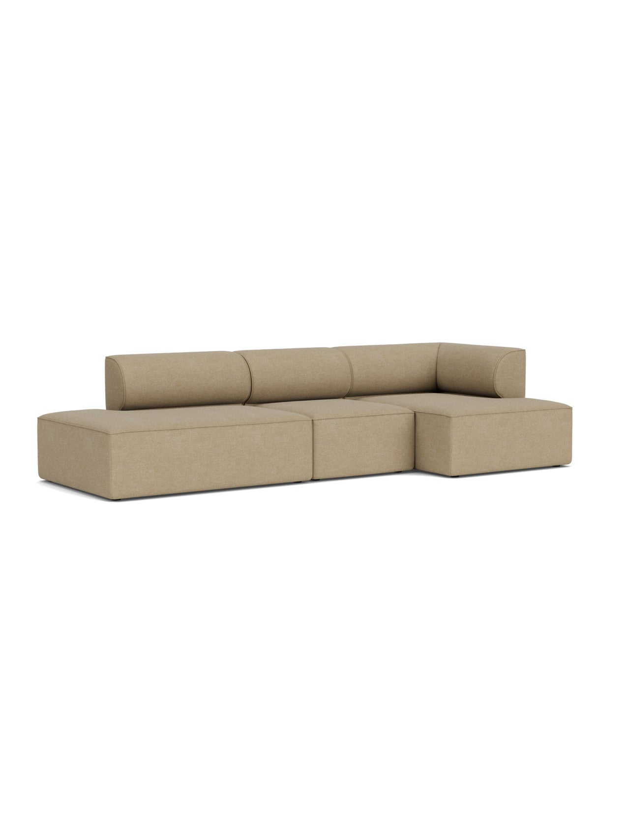 Angled view of the Eave Modular Sofa, Configuration 9. The L-shaped sofa is upholstered in a textured beige bouclé fabric.