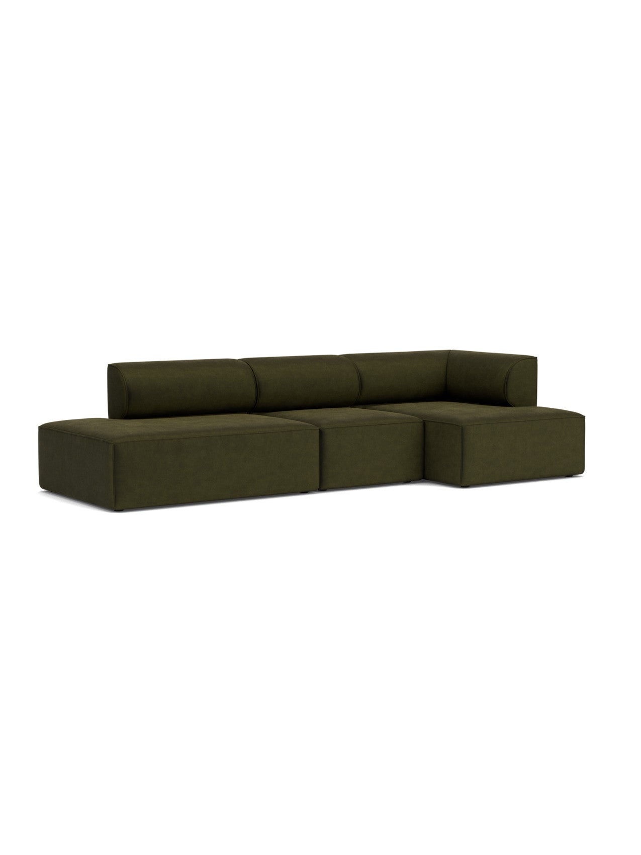 Angled view of the Eave Modular Sofa in Configuration 9. The L-shaped sofa is upholstered in dark green Champion 035 fabric.
