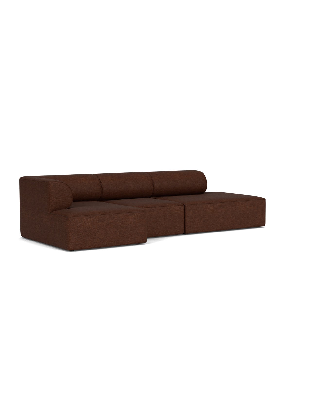 An angled view of the Eave Modular Sofa, 96, Configuration 10, an L-shaped sofa upholstered in a dark brown bouclé fabric.