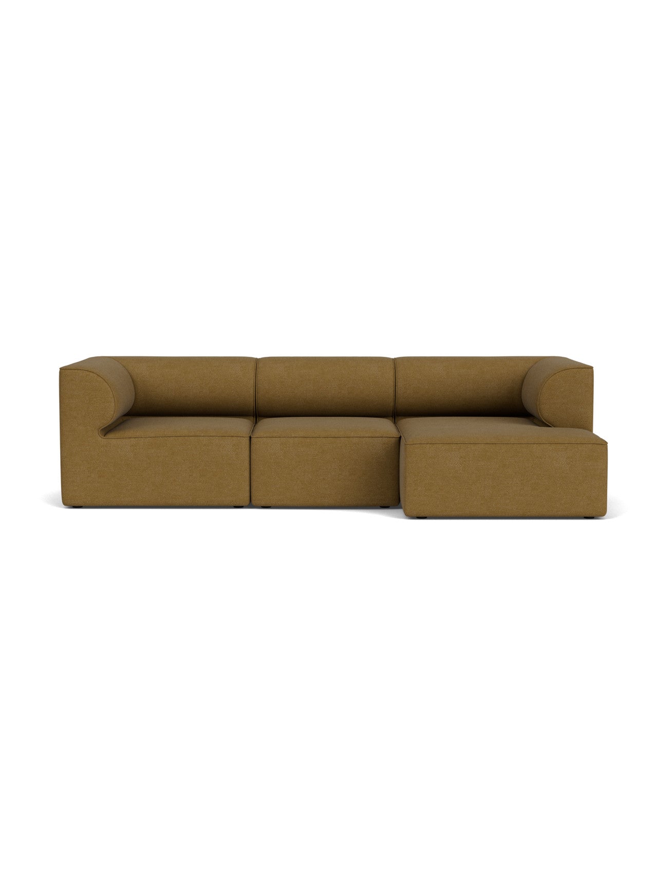 A front view of the Eave Modular Sofa, configuration 11, featuring a right-side chaise longue in an ochre-coloured bouclé.