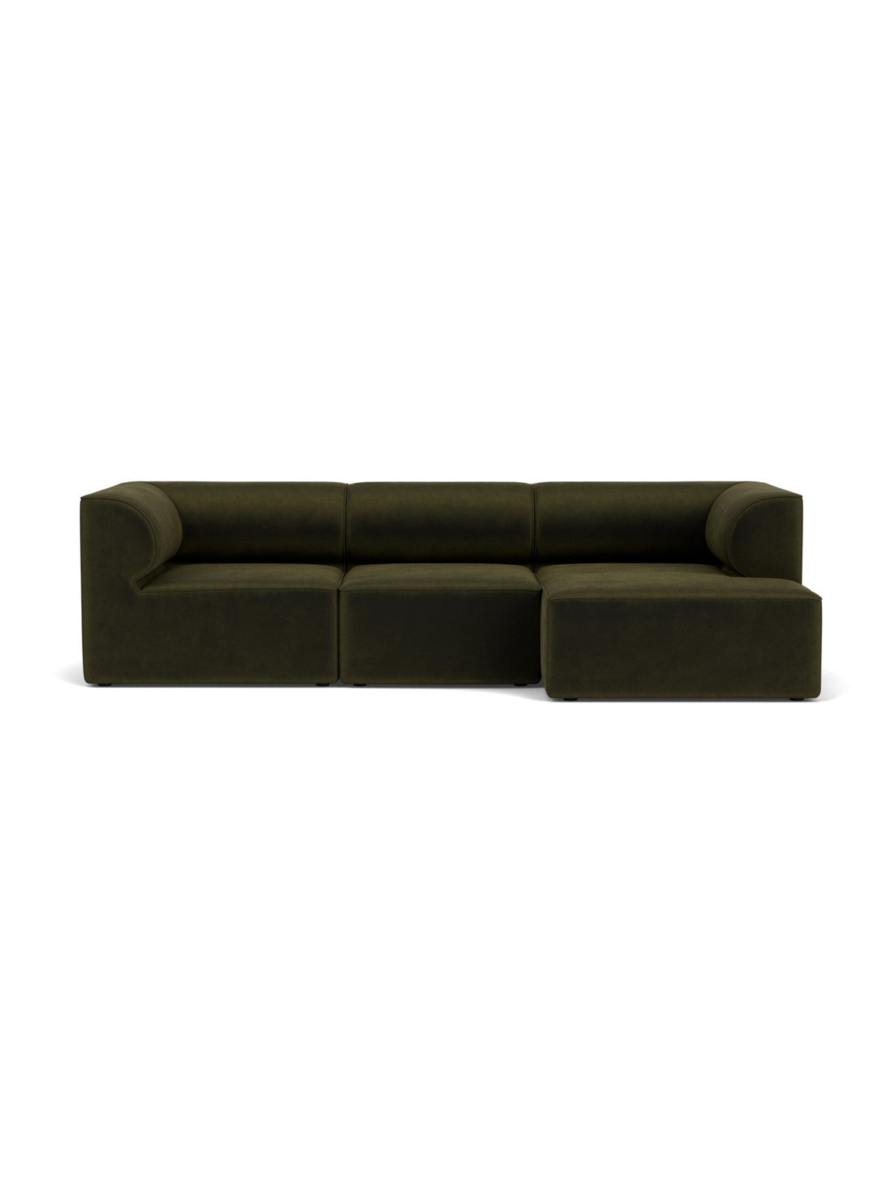 Front view of the Eave Modular Sofa, a 3-seater in dark green fabric with a chaise longue on the right.