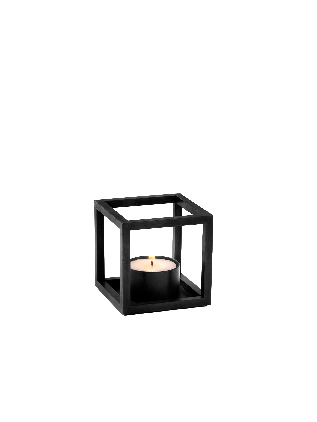 The Kubus T candle holder in black, a cube-shaped frame holding a single lit black tealight against a plain white background.