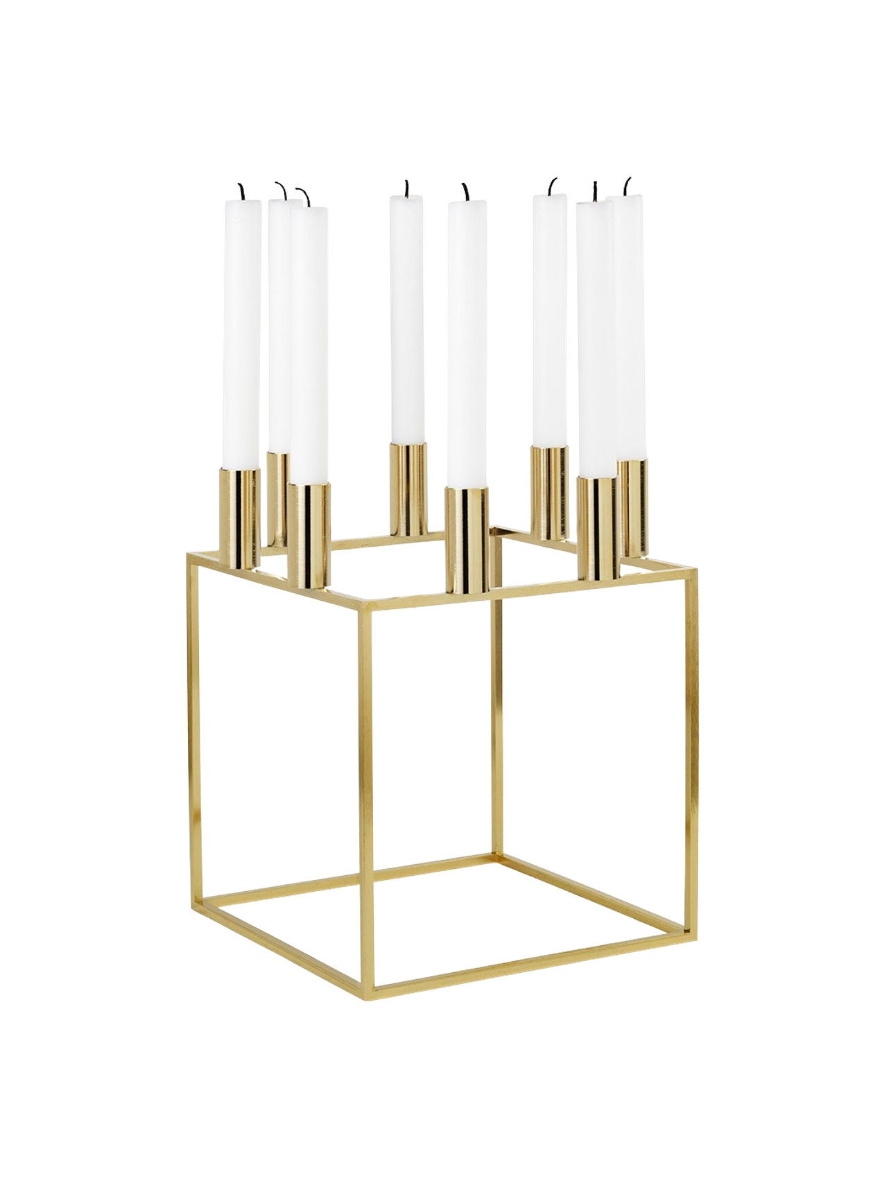 A gold-plated Kubus 8 candle holder with a square frame, holding eight unlit white candles, shown from an angle.