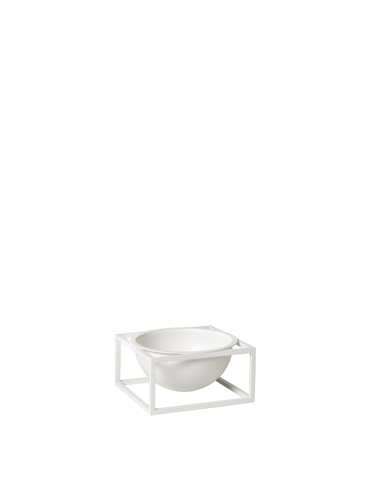 The small Kubus Bowl Centerpiece in white, featuring a round bowl held within a minimalist, square metal frame.
