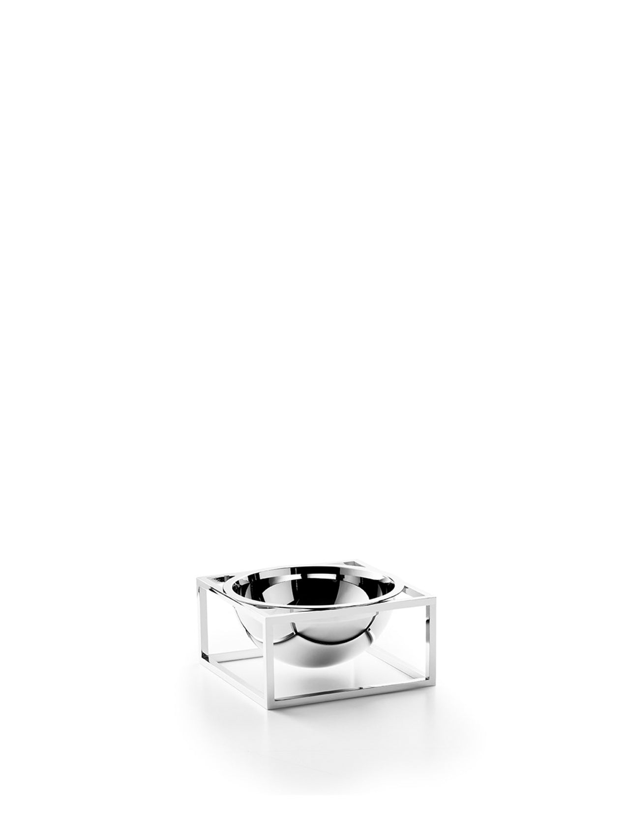 Audo CPH Kubus Bowl by Mogens Lassen, a polished chrome bowl held in a minimalist square frame on a white surface.