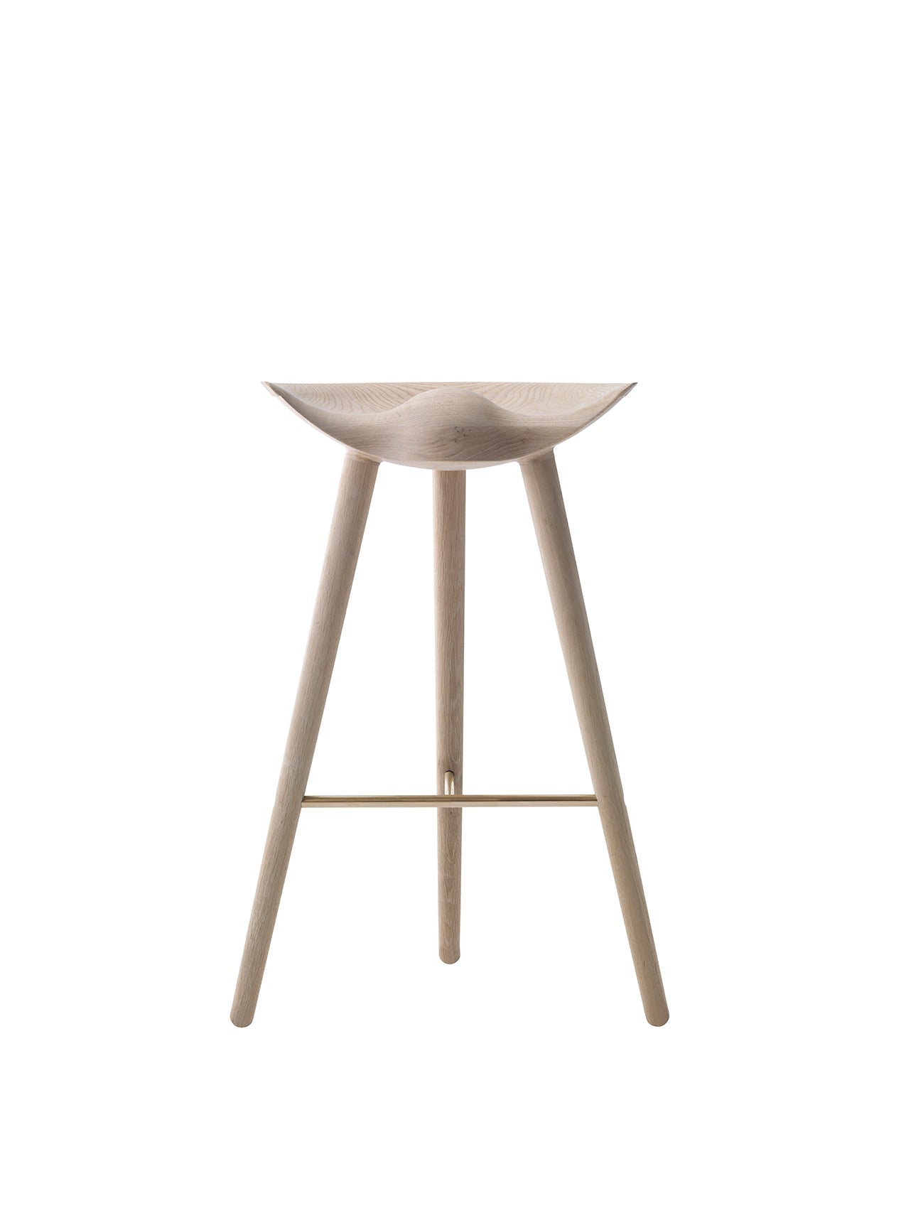 Front view of the ML 42 Bar Stool in oak. The three-legged stool features a sculptural, moulded seat and a brass footrest.