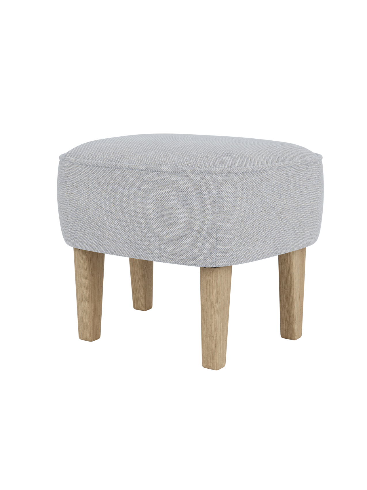 The Ingeborg Ottoman viewed from a three-quarter angle, upholstered in light grey Fiord 751 with natural oak legs.