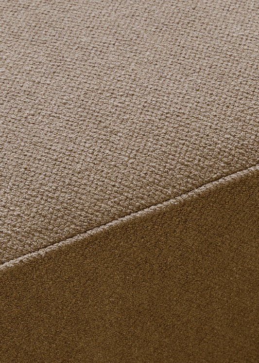 A detailed close-up of the Audo Bouclé 02 fabric on the Eave Modular Sofa, 86, Pouf, showing its textured, looped weave.